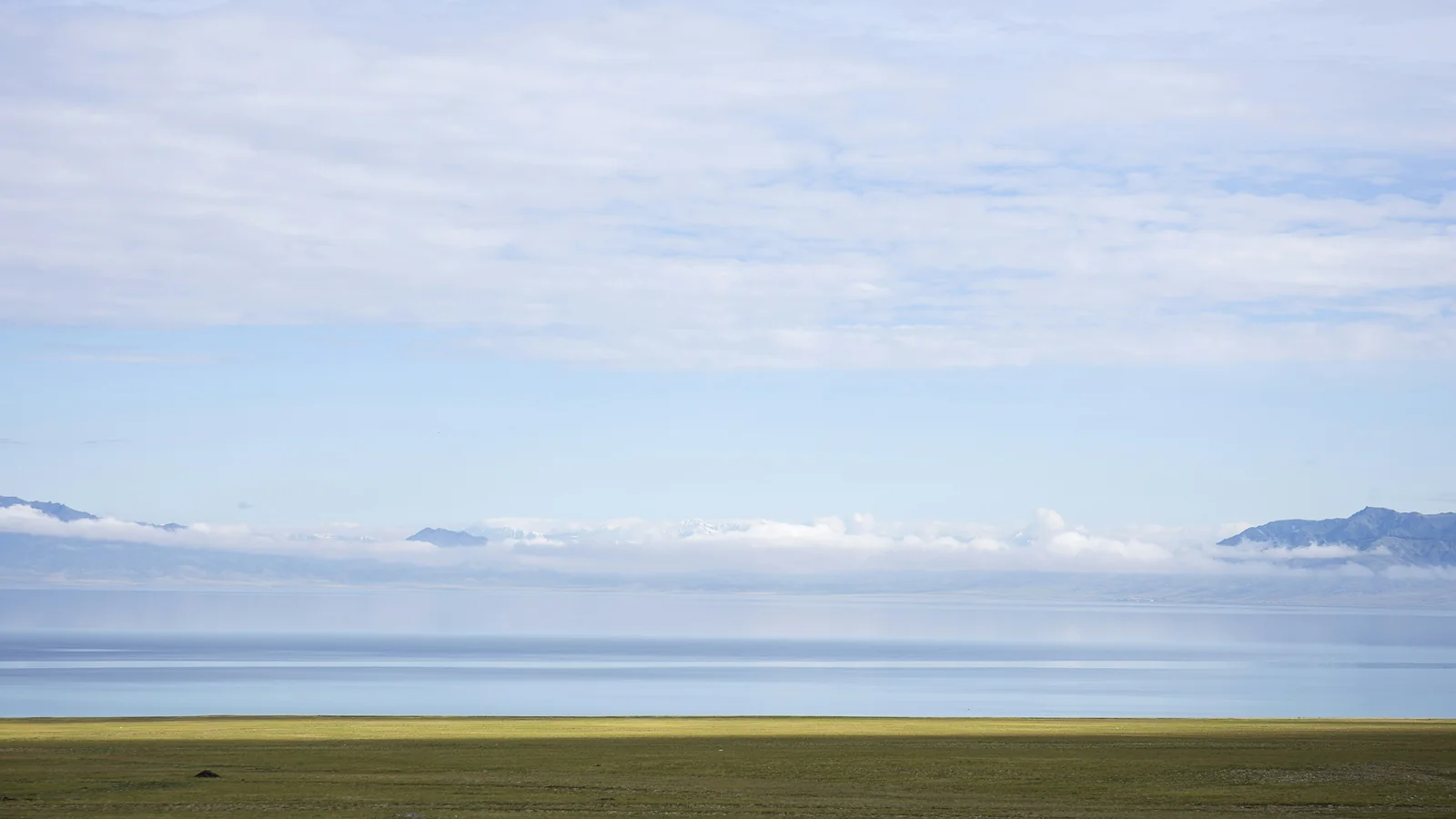 Sayram Lake beneath clouds