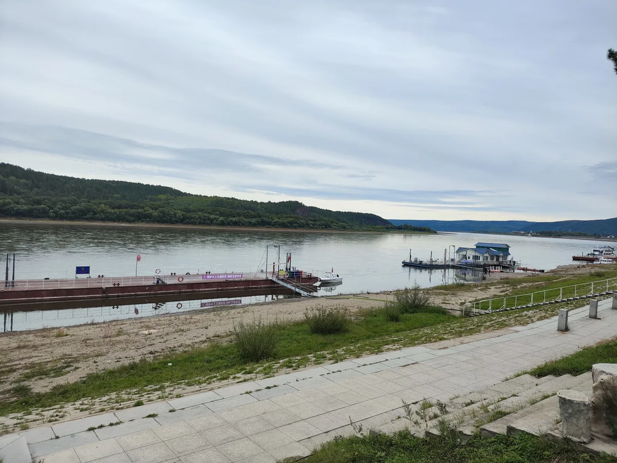 Beiji Village · Riverside pier in the warmer season; winter scenery differs