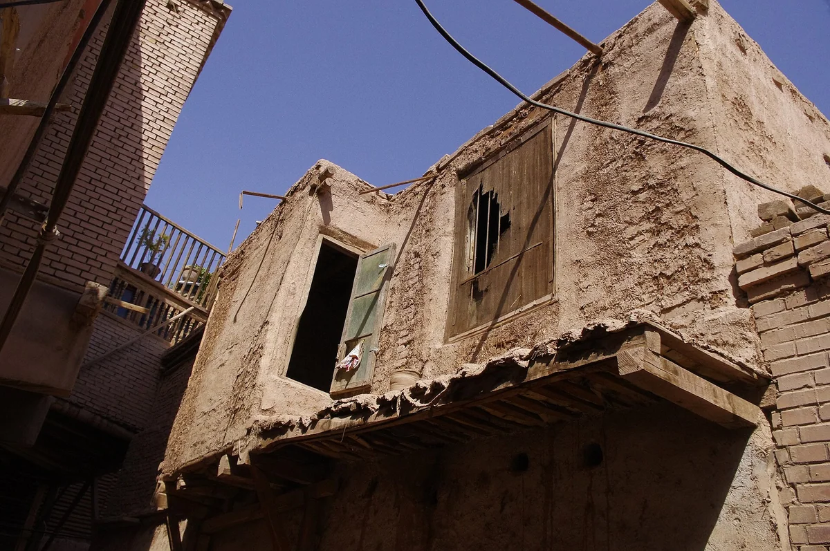 Earthen walls and timber details in Kashgar’s Old City.