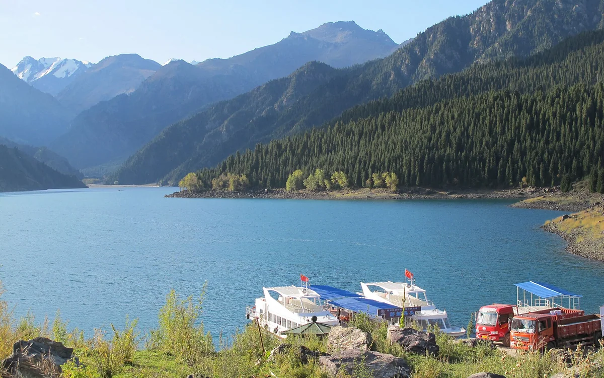 A view from the pier across Heavenly Lake and its mountain backdrop.