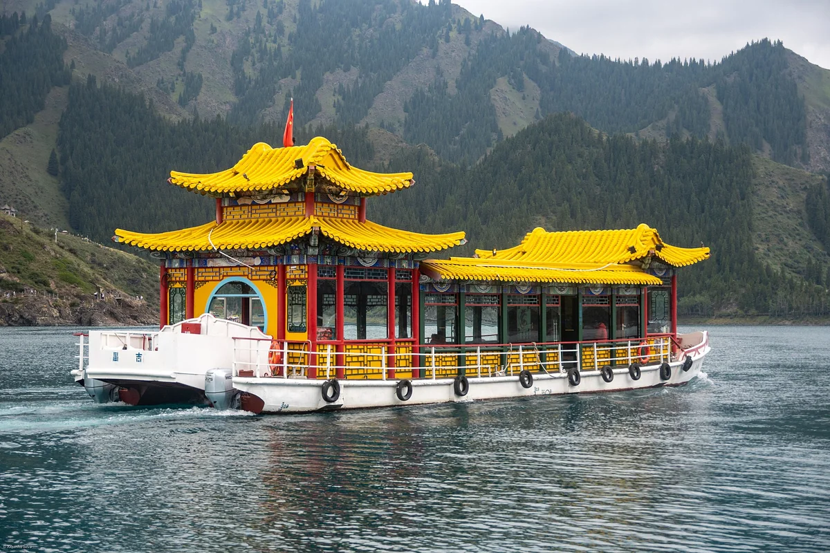 A traditional-style sightseeing boat on Heavenly Lake.
