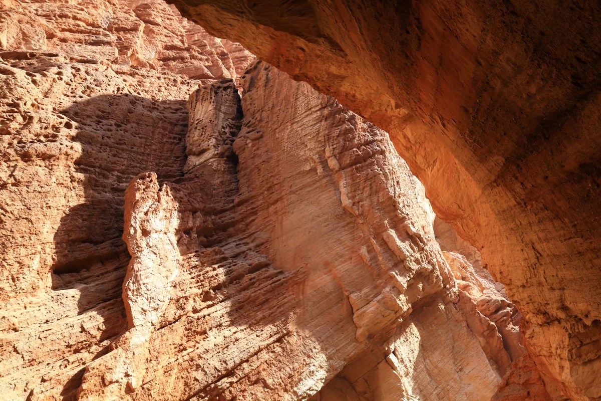 Light traces the red walls of Kuqa’s Tianshan Grand Canyon.