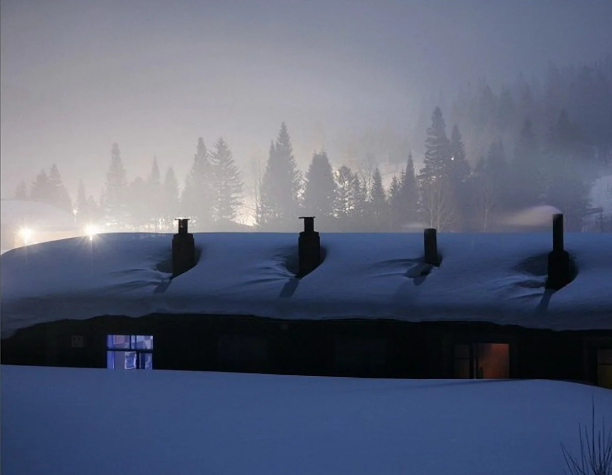 Beiji Village · Snow-covered roofs and distant woodland