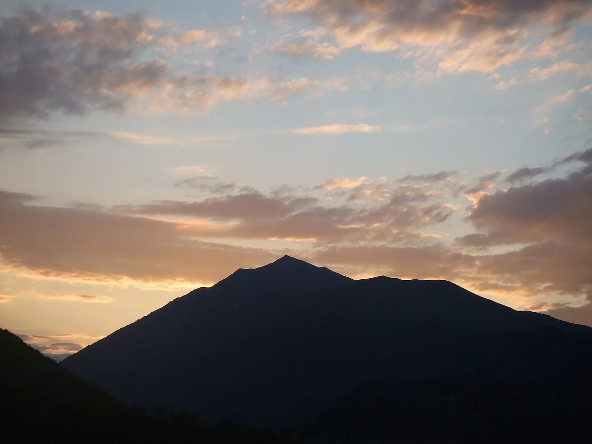 Evening light over Hemu’s mountains sets a gentle tone for the night.