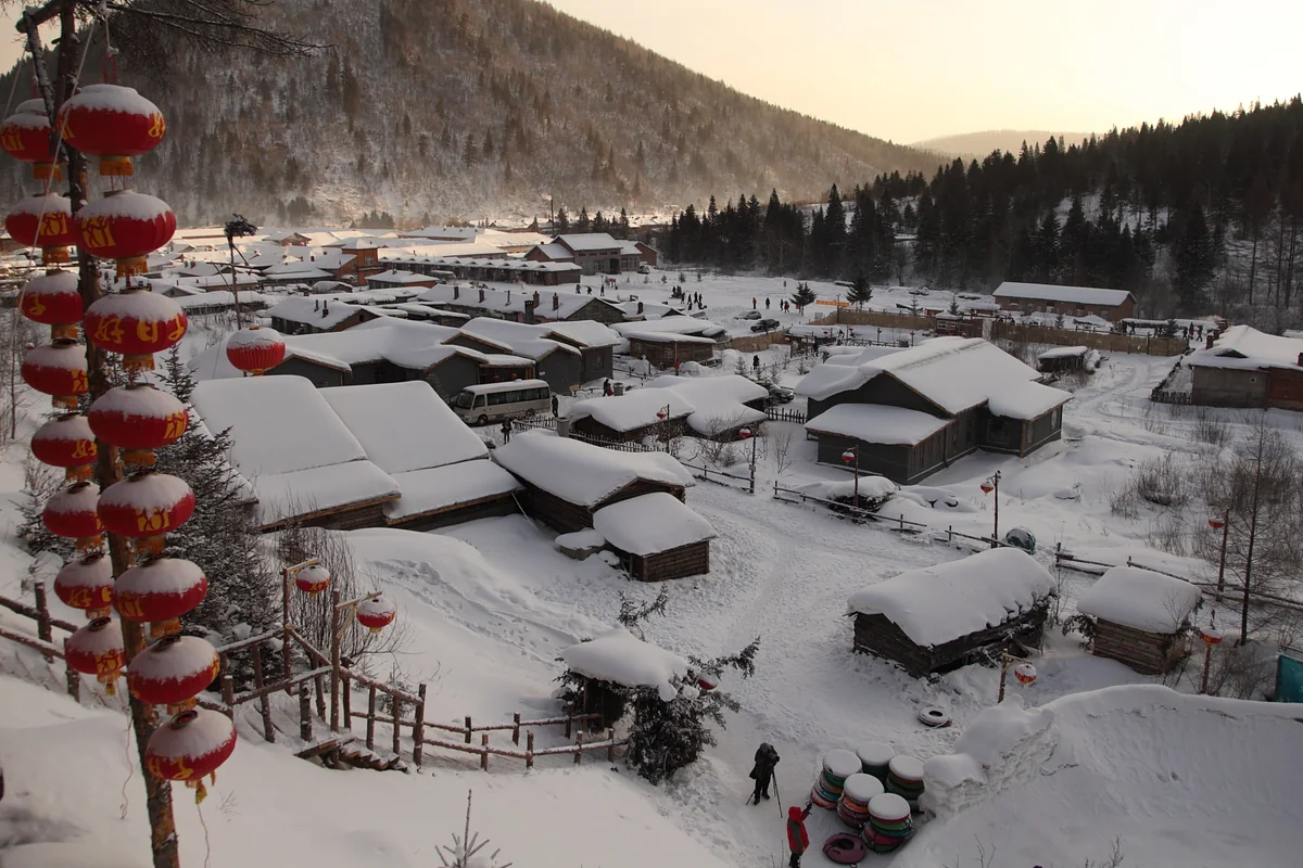 China Snow Town · Snow-covered roofs in the morning light